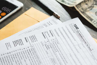 How to file back taxes as an American expat (avoid penalties & delays)