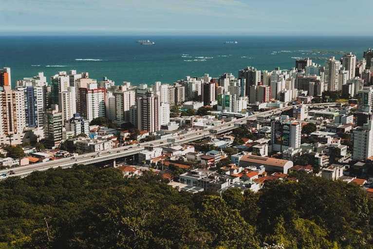 Aerial View of Urban Skyline and Ocean
