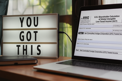 A laptop displaying GILTI form