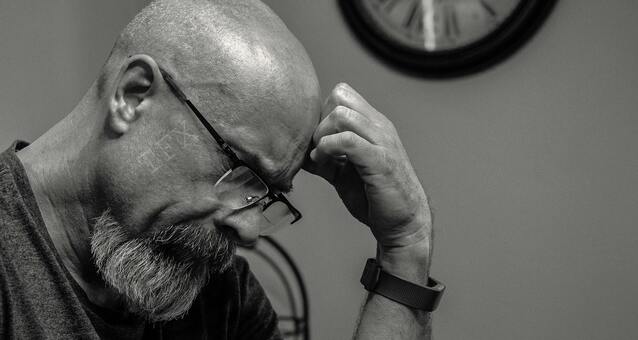 A man thinks about minimum income